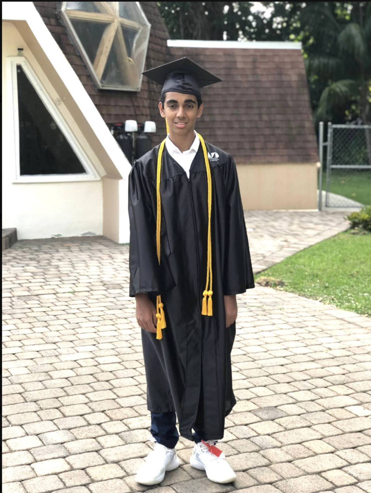 Nathan Thomas on the day of his Miami Dade College commencement ceremony at 14.